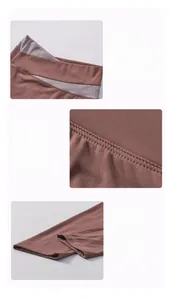 Dettaglio dei pantaloni da yoga a vita alta con cuciture di precisione e vita a contrasto