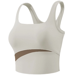 Women's shockproof sports bra with wide straps and contrasting side patchwork detail