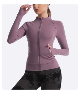 Detail of mauve slim-fit yoga jacket with thumbholes and invisible zipper pockets