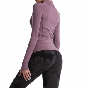 Slim fit dark purple yoga jacket with stand collar and black tie-dye leggings