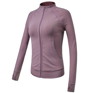 Women's slim fit zip-up yoga jacket with stand collar and thumb holes in dusty pink