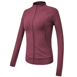 Slim fit burgundy yoga jacket with stand collar and thumb holes for women’s workout