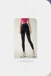 Detail of breathable mesh panels on high-waist black yoga leggings for women