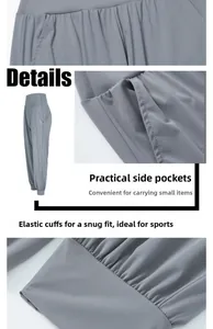 Détails du jogging gris à taille haute avec poignets élastiques et poches latérales