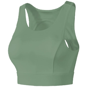 Detail of sage green wide shoulder strap sports bra with racerback design and elastic hem