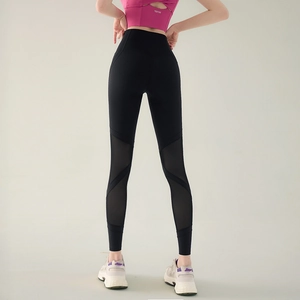 High waist black yoga leggings with mesh splicing and lifting effect for fitness