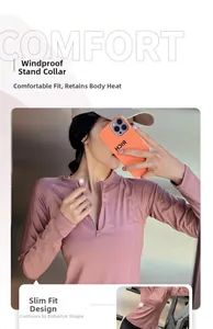 Détail du haut fitness rose-violet avec col montant coupe-vent et demi-fermeture éclair