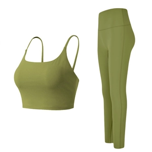 Two-piece olive green yoga set with thin strap sports bra and high waist leggings