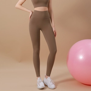 Women's quick-dry brown yoga set featuring high-waisted leggings and sports bra
