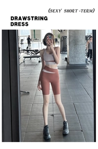 Detail of high waist yoga shorts and sports top with irregular hollow out design