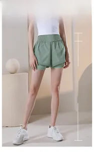 Wide elastic high waistband and double-layer design of mint green sports shorts