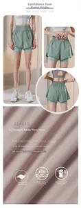 Detail view of double-layer sage green sports shorts featuring breathable nude-feel fabric