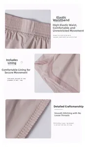 Detail view of pink sports shorts showing elastic high waist and built-in liner