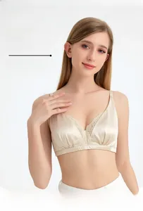 Detail of champagne silk lace bra with soft seamless design and thin padded comfort