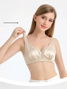 Detail of champagne silk lace bra featuring wireless design and soft support structure