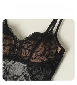 Close-up of black water-soluble lace and breathable mesh on a silk bra