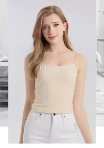 Slim fit mulberry silk camisole with thin straps and chest pads in light apricot color