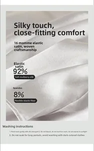 Detail view of 92% mulberry silk fabric showing premium satin texture and care labels