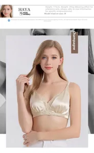 Detail of silk lace bra in champagne, showcasing fine fabric texture and V-neckline