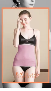 Close-up of seamless pink wool waist warmer with fine knit texture for thermal comfort