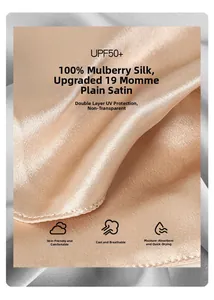 Détail du tissu en soie de mûrier 19 mommes avec protection UPF50+ et texture dorée