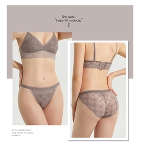 Detailed view of women's silk and lace lingerie set in elegant dusty rose color
