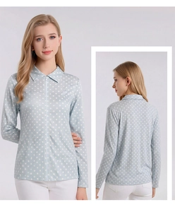 Front and back views of a light blue polka dot silk shirt with zipper and lapel collar