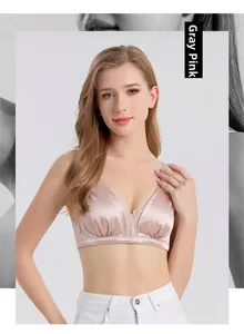 Detail of dusty pink mulberry silk lace bra showing delicate texture and thin straps