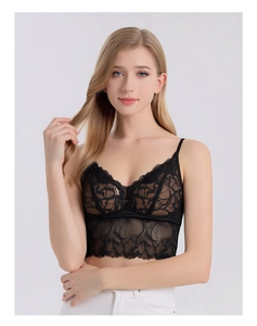 Close-up of black silk lace camisole showing detailed floral embroidery and thin straps