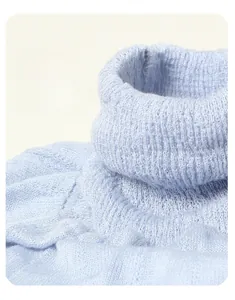 Macro shot of light blue mulberry silk neck warmer showing the fine knitted texture