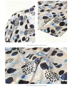 Detail of silk printed long sleeve shirt featuring metal zipper and blue dot pattern