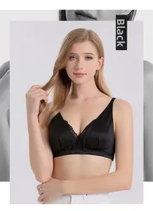 Detail of silk satin fabric and delicate black lace trim on a wireless V-neck bra