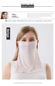 Detail of beige pure silk breathable sun protection face mask on model with neck cover