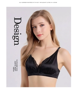 Detailed close-up of black mulberry silk bra with exquisite lace trim on V-neckline