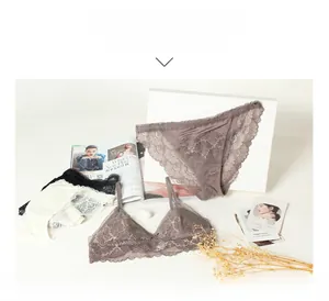 Close-up of elegant lace lingerie set featuring silk gusset in dusty pink and black