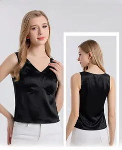 Close-up of elegant black silk V-neck camisole with a smooth satin finish for women