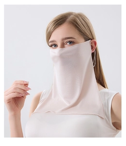 Detail view of pink 100% mulberry silk sun mask showing smooth texture and neck coverage