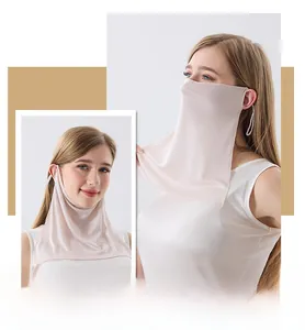 Detail view of light beige silk sun mask with neck protection and breathable fabric