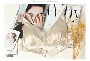 Detail of silk champagne lace bra featuring a V-neckline and elegant floral embroidery