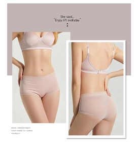 Détail du slip en soie taille haute avec bordure en dentelle et finition sans couture