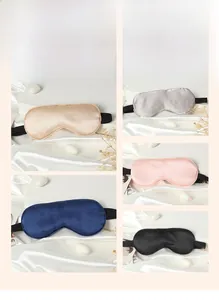 Silk sleep masks in champagne, silver, and pink showing elastic strap details