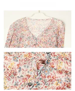 Detail of silk mesh sun protection shirt with floral print and high-quality buttons