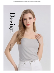 Detail of grey silk camisole top showing lightweight lustrous fabric and thin straps