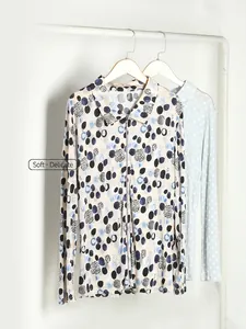 Women's silk print long sleeve shirt with zipper front and geometric pattern