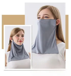 Detail view of a breathable grey silk sun protection face mask with ear loops for women