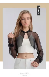 Detail of black 100% silk mesh shrug featuring a high neck buckle and sheer texture