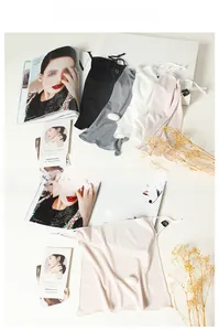 Detailed view of silk sun protection masks in multiple colors with adjustable ear loops