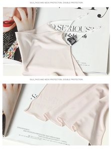 Detail of silk sun mask showing smooth fabric texture and adjustable elastic ear loops