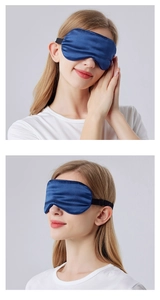 Detailed view of deep blue silk sleep mask with adjustable elastic strap on model