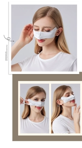 Detailed close-up of white mulberry silk nose mask with ear loops for cold air protection